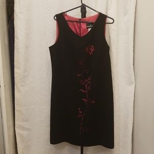 Positive Attitude black dress w/ lazer cut roses
